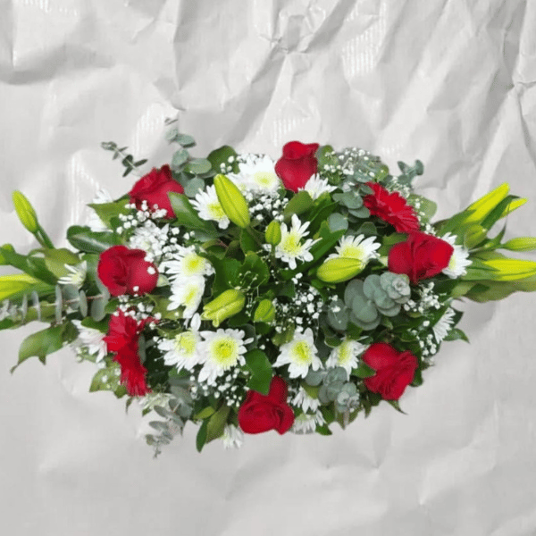 Cojín floral fúnebre rojo