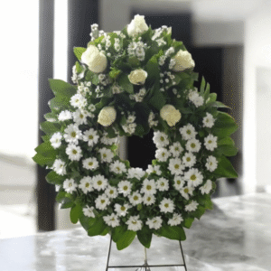 Corona floral redonda con pucho de rosas blancas