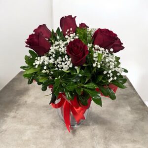 Pecera de 9 rosas rojas